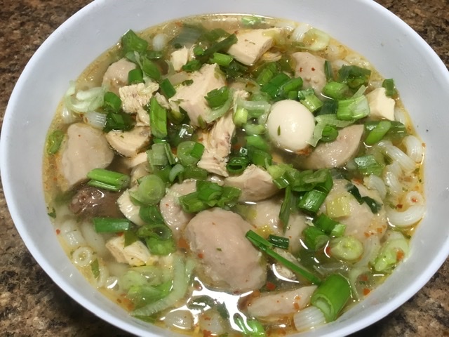 Kow Piek Sen (Chicken Soup with Pork Meatballs, Quail Eggs, and Rice Macaroni)