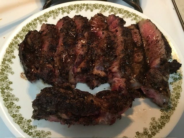 Pepper Encrusted Bone In Rib Eye